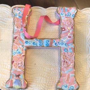 💓 “H” Hope Handcrafted - bits of porcelain plates and such with hanging ribbon.